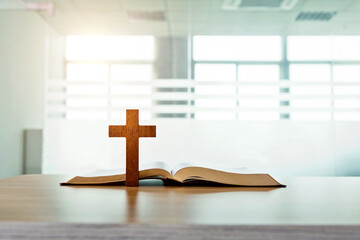 Wall Mural - Wooden cross and bible book on the table