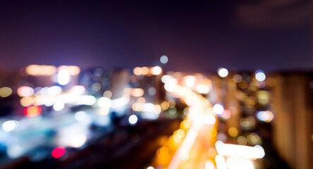 Canvas Print - Defocused blur of cityscape at night