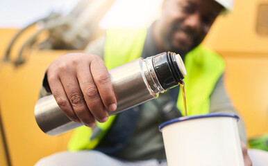 Poster - Black man and construction worker on lunch for coffee or tea in cup on site, doing cargo and shipping. Male contractor, smile and guy use mug for hot beverage in flask and helmet for logistics work.