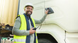 © Nicholas Felix/peopleimages.com - Truck driver, black man and export logistics manager working in industrial shipping yard, manufacturing industry and transport trade. Portrait, delivery truck cargo and happy distribution courier job
