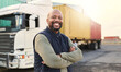 © Nicholas Felix/peopleimages.com - Delivery, container and happy truck driver moving industry cargo and freight at a shipping supply chain or warehouse. Smile, industrial and black man ready to transport ecommerce trade goods or stock