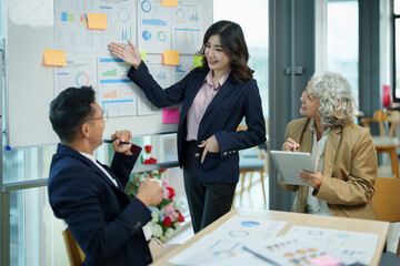 Asian entrepreneurs and business people meeting in a conference room in business planning, financial budget and investment risk assessment to analyze customer groups to increase company growth