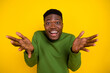 © deagreez - Portrait of attractive cheerful funny guy asking you question welcome isolated on bright yellow color background