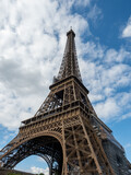 Fototapeta Paryż - Looking skyward from the base of the Eiffel Tower