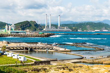 View Of The Coastal Swimming Pool At Heping Island Park In Keelung, Taiwan. Keelung Hsieh-ho Power Plant Is Just In The Back.