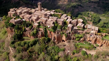 Canvas Print - One of the most beautiful italian villages aerial drone view, Civita di Bagnoregio, called ghost town. popular tourist destination in Italy, Lazio region, Viterbo province