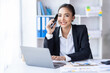 © David - Beautiful Young business Asian Woman Talking on Smartphone in workplace