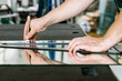 © Rochu_2008 - Glazier cuts a mirror on a special table, Glass industry