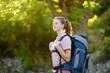 © Maria Sbytova - Young woman hiking in countryside. Backpacking hike