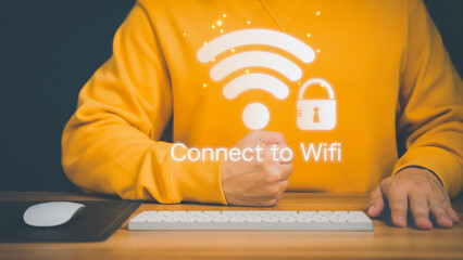 Aufkleber - Man using a computer keyboard to connect to wifi and waiting to loading digital business data form website, concept technology of waiting for connect to wifi.