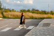 © Ruslan Ivantsov - schoolgirl crosses the road at a pedestrian crossing