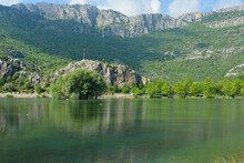 Mountain Covered With Trees On The Lake Shore. Turkish Park Name:" Kuğulu Park"