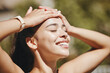 © Siphosethu Fanti/peopleimages.com - Face, relax and happy woman in sunshine, outdoor fresh air and peaceful break for mental health, wellness and body. Summer, happiness and smile latino girl relax in nature, park rest and calm freedom