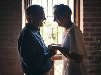 Canvas Print - Love, happy family and senior couple laugh and relax in dark room, bond and share funny joke in their home. Retirement, humour and affection by sweet elderly man and woman smile, enjoy time together