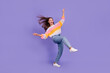 © deagreez - Full body photo of cheerful adorable person stand one leg rejoice isolated on violet color background