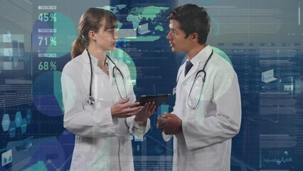 Canvas Print - Animation of financial data and graphs over caucasian female and male doctors