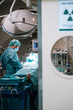 © ADDICTIVE STOCK - Surgeon standing near patient