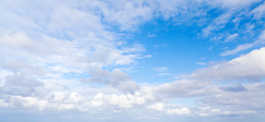 Wall Mural - blue sky with white altocumulus clouds on a daytime