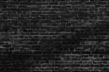 Wall Mural - old dark black brick wall. empty aged brickwall texture background.
