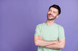 © deagreez - Photo portrait of nice young guy crossed hands look empty space shopping promo wear trendy gray clothes isolated on violet color background