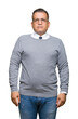 © Krakenimages.com - Middle age bussines arab man wearing glasses over isolated background Relaxed with serious expression on face. Simple and natural looking at the camera.
