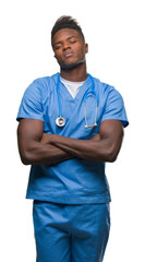 Poster - Young african american doctor man over isolated background wearing surgeon uniform skeptic and nervous, disapproving expression on face with crossed arms. Negative person.