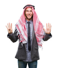 Sticker - Young handsome arabian man with long hair wearing keffiyeh over isolated background showing and pointing up with fingers number nine while smiling confident and happy.