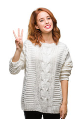 Poster - Young beautiful woman over isolated background wearing winter sweater showing and pointing up with fingers number three while smiling confident and happy.