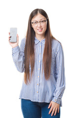 Wall Mural - Young Chinese woman over isolated background showing broken smartphone screen with a happy face standing and smiling with a confident smile showing teeth