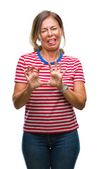 Poster - Middle age senior hispanic woman over isolated background disgusted expression, displeased and fearful doing disgust face because aversion reaction. With hands raised. Annoying concept.