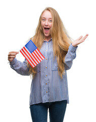 Sticker - Blonde teenager woman holding flag of United States of America very happy and excited, winner expression celebrating victory screaming with big smile and raised hands