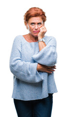 Poster - Atrractive senior caucasian redhead woman wearing winter sweater over isolated background looking stressed and nervous with hands on mouth biting nails. Anxiety problem.