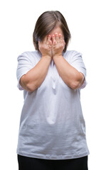 Poster - Young adult woman with down syndrome over isolated background with sad expression covering face with hands while crying. Depression concept.