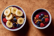 Açaí Bowl With Granola, Tropical Fruits, Banana, Strawberry, Raspberry, Condensed Milk And Cereal. Selective Focus. Close Up