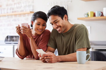 Poster - Phone, social media and couple with a man and woman in the kitchen of their home together in the morning. Mobile, coffee and communicaton with a married male and female reading a text in their house