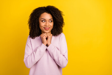 Wall Mural - Photo of young lovely lady arms touch chin guess dream look empty space plan isolated over yellow color background