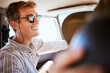 © Siphosethu Fanti/peopleimages.com - Road trip, friends and man relax in a car, bonding with driver in the passenger seat. Freedom, summer and adventure with smiling man enjoying vacation and drive in city, laughing, joking and cheerful