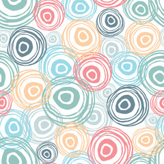 Wall Mural - Scattered scribble circles on a white background. Pastel colors. Abstract seamless pattern. Hand drawn elements background for wrapping, fabric, wallpaper or cards.