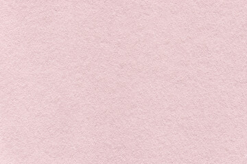 Wall Mural - Texture of vintage light pink colors paper background, macro. Structure of dense rose gold craft cardboard.