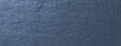 © nikol85 - Navy blue background of natural slate. Texture of rough dark cool gray stone backdrop, closeup.