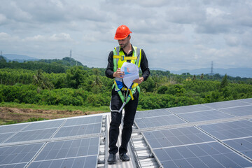 Poster - Technician checks and maintenance of the solar panel at solar power plant,Solar panels.