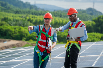 Wall Mural - Operation and maintenance in solar power plant,Engineering checking and maintenance on solar cell on roof factory.