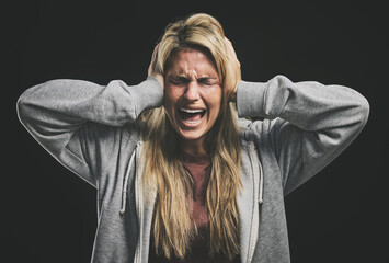 Wall Mural - Anxiety, bipolar woman crying, frustrated or crazy on a dark studio for psychology and mental health mock up. Trauma, schizophrenia or depressed girl shout with depression, fear and mental illness