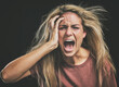 Face, mental health and screaming woman headache, anxiety or stress. Psychology, bipolar or crazy, insane or depressed schizophrenia female, shouting or hearing voices alone on dark studio background