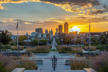 Wall Mural - View of the downtown Des Moines skyline from the steps of the Iowa State Capitol Building at sunset.