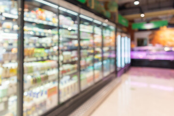 Wall Mural - supermarket grocery store aisle and shelves blurred background