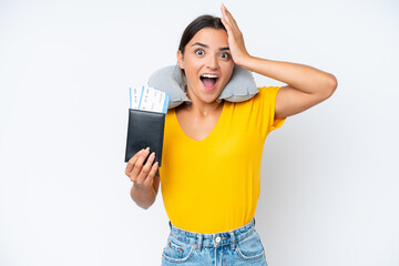 Poster - Woman with Inflatable Travel Pillow over isolated background with surprise expression