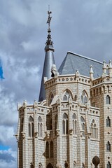 Wall Mural - Building facade of episcopal palace of Astorga under blue bright sky in Spain