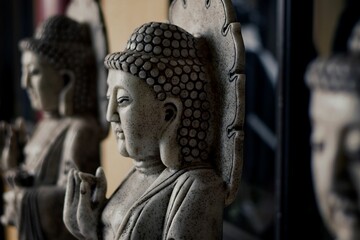 Wall Mural - Closeup of stony Buddha statue