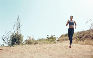 Wall Mural - Woman, hiking and running on mountain in mockup, workout or fitness. Runner, wellness and exercise in training, sports and health on adventure in nature in summer with hill, girl and sky in Australia